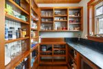 Large, Well-Stocked Pantry off the kitchen